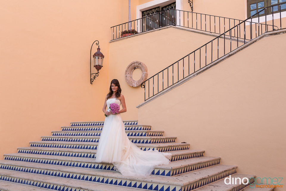 Beautiful Shot Of A Bride On The Stairs By The Talented Destination Wedding Photographer In Cabo Dino Gomez