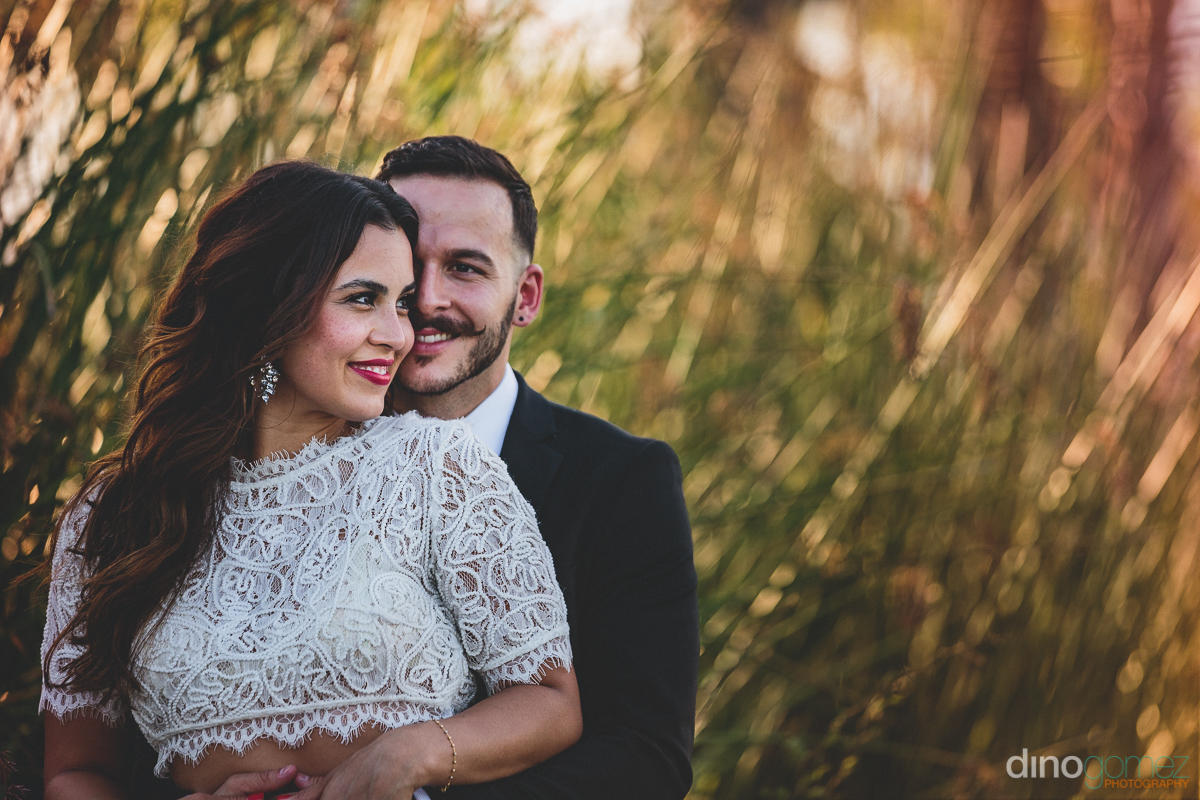 Newlyweds Under Palm Trees At Barcelo Grand Faro Hotel