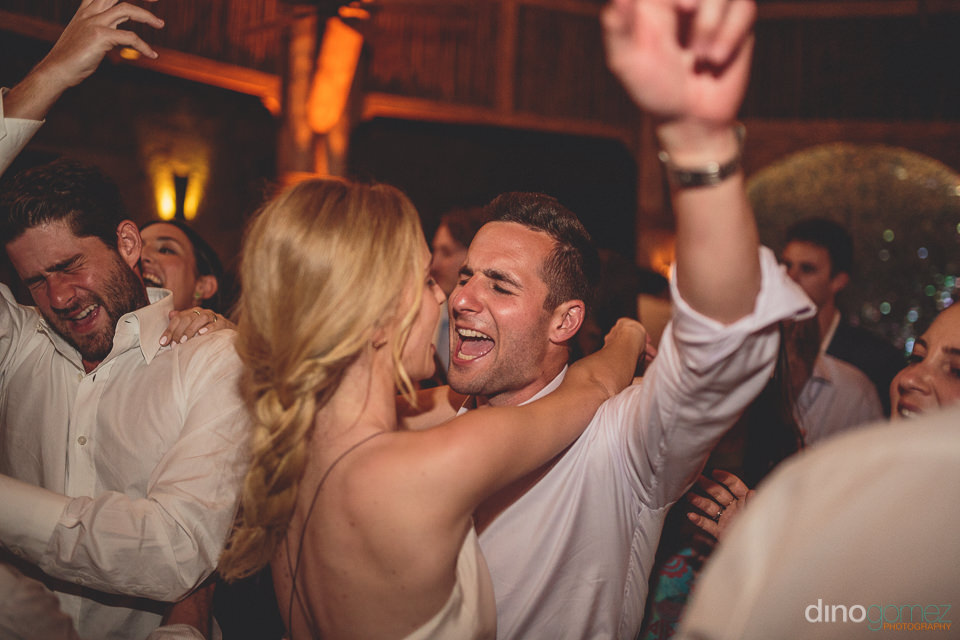 A Lively Wedding Reception in Cabo Photographed by Wedding Photographer Dino Gomez