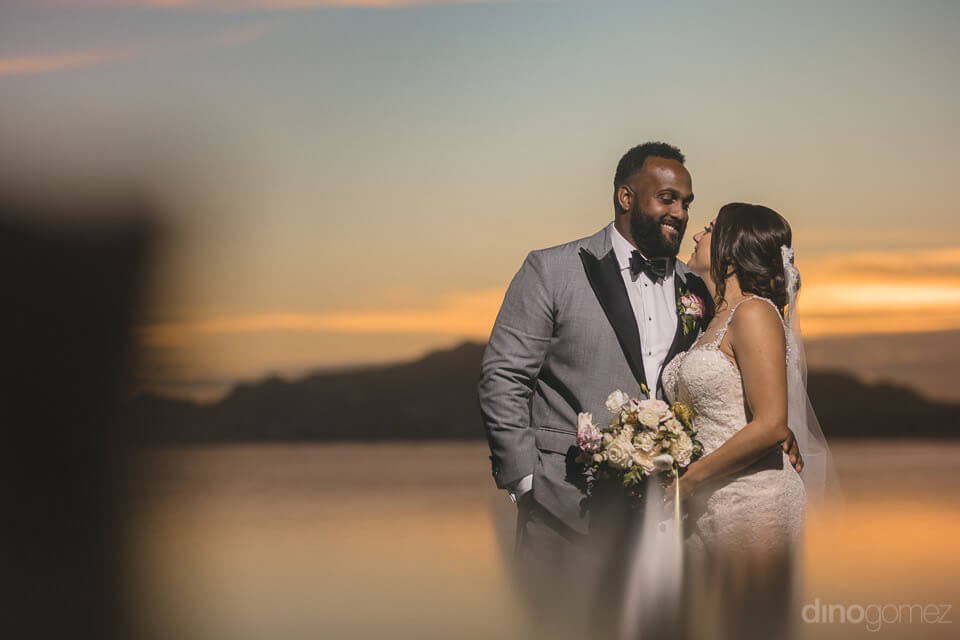 The bride and groom at sunset - Kimber & Julius' Warmsley Wedding