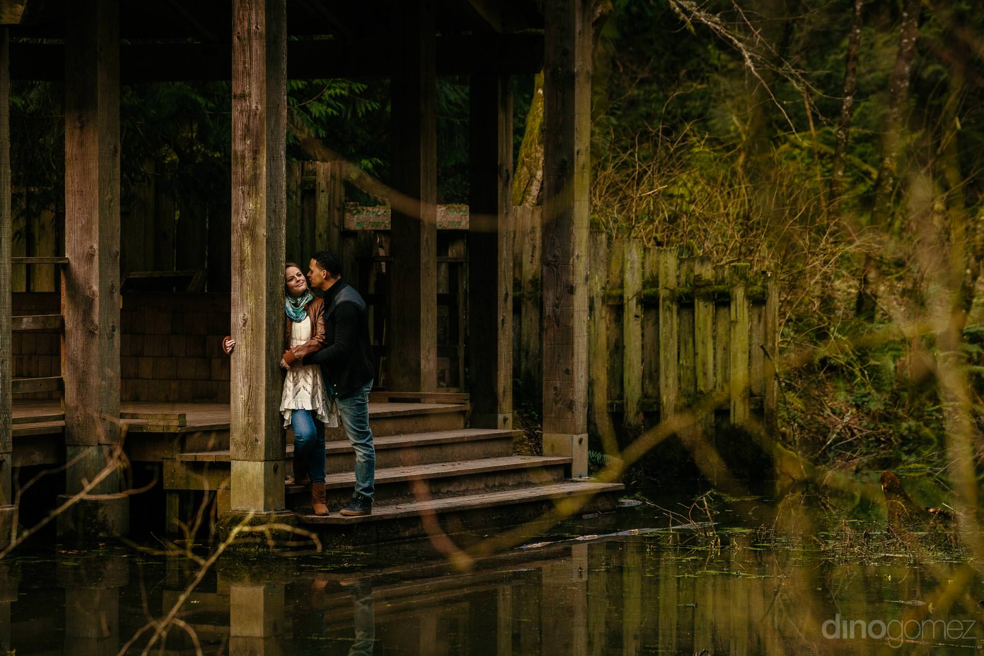Couple On A Wooden Porch Next To A Pond By Portland Wedding Photographer Dino Gomez Photography