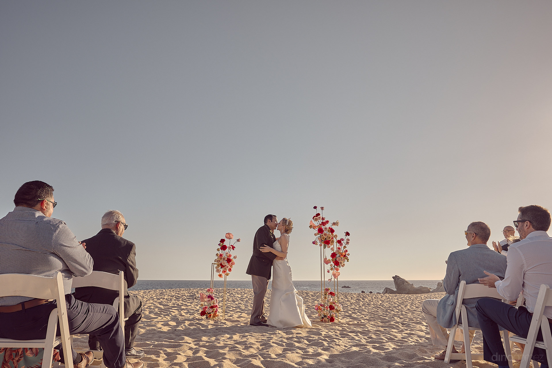 A Couple Getting Married On The Beach.